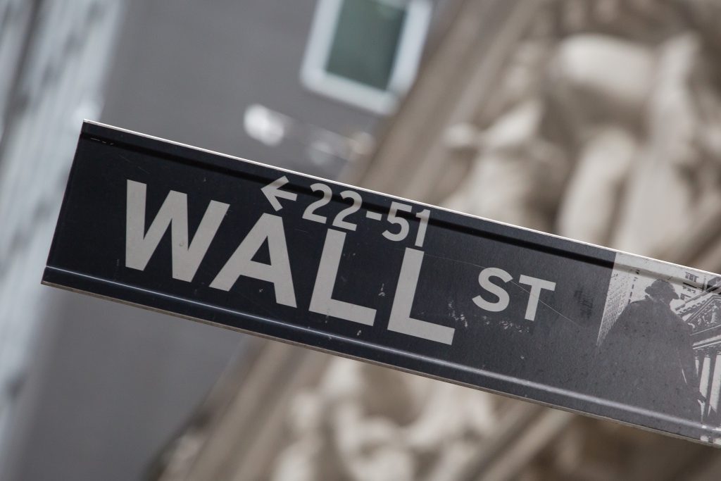 A sign for Wall Street in New York, U.S.. Photographer: Michael Nagle/Bloomberg